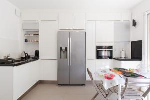 Appartements 2 pieces climatise a 200m des plages : photos des chambres