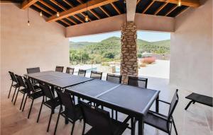 Maisons de vacances Nice home in St Thom with 7 Bedrooms, WiFi and Outdoor swimming pool : photos des chambres