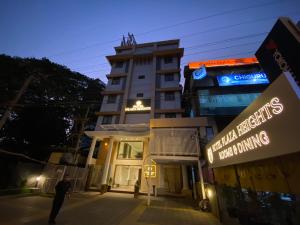 Hotel Plaza Heights by RAK Rooms, Mangaluru