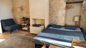 Appartements Au bois radieux - gite authentique option massage : photos des chambres