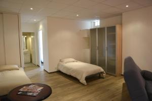 Hotels Hotel Les Arceaux : photos des chambres