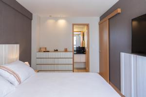 Kalug - VISTA MAR, dois quartos CASAL, suíte com SMART TV, academia e WI-FI 350mbps na Praia dos Milionários