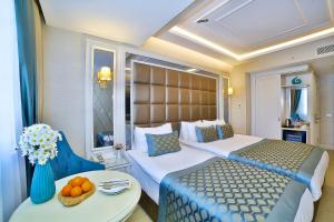 Deluxe Family Room room in Büke Hotel