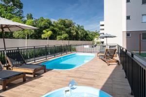 Apartamentos em Bal Piçarras 150 M DA PRAIA com SACADA, WI-FI, PISCINA, PORTARIA 24h, PLAYGROUND e vaga de GARAGEM