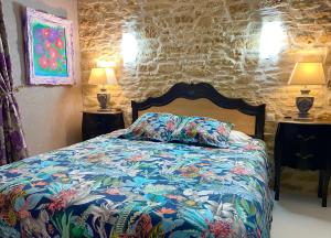 B&B / Chambres d'hotes O Clair de Lune Chambres d'hotes climatisees a Sarlat - parking prive - piscine chauffee - espace bien-etre Jacuzzi et massages : photos des chambres