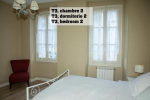 Appartements Logements A 2 PETITS PAS : photos des chambres