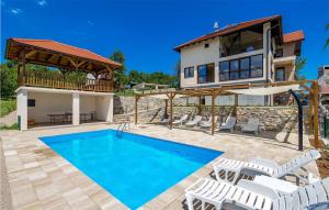 Nice Apartment In Rakovica With Outdoor Swimming Pool, Wifi And 1 Bedrooms