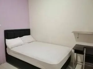 Wisma Lusya near GOR Satria RedPartner - 巴图拉登