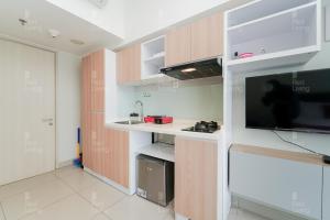 RedLiving Apartemen Springlake Summarecon - Novi Rooms Tower Freesia