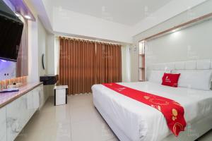 RedLiving Apartemen Springlake Summarecon - Novi Rooms Tower Freesia
