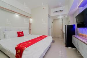 RedLiving Apartemen Springlake Summarecon - Novi Rooms Tower Freesia