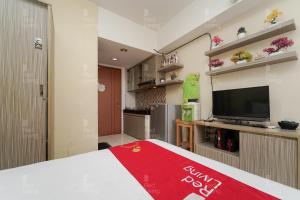 RedLiving Apartemen Margonda Residence 4 - Si Boy