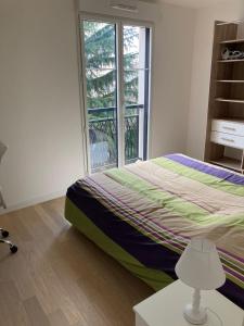 Appartements Nice and quiet 40m in Courbevoie with parking : photos des chambres