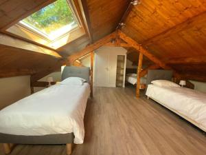 Maisons de vacances Magnifique lodge dans la foret de Fontainebleau : photos des chambres