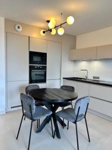 Appartements Le Lily - T2 neuf vue mer : photos des chambres