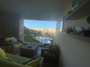 Plage des Nations beautifully decorated apartment with a swimming pool view