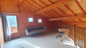 Chalets Ravissant chalet en madrier : photos des chambres