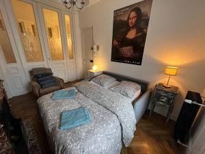 Appartements La petite place de la Porte d'Arras : photos des chambres