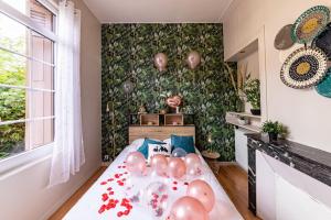 Appartements Suite Amazonia ~ Balneo ~ Arrivee Autonome : photos des chambres
