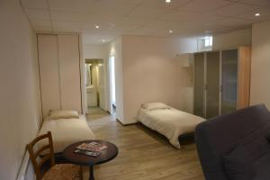 Hotels Hotel Les Arceaux : photos des chambres