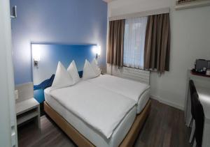 Comfort Twin Room room in Acquarello Swiss Quality Hotel