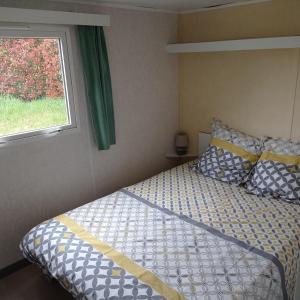 Campings CAMPING LE BEL AIR mobil home LE PALMIER 4 personnes : photos des chambres