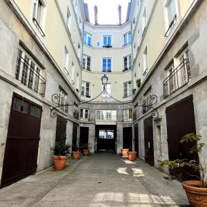 Appartements Le jardin de ville : photos des chambres