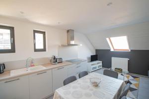 Maison L'Aiguille - 2 appartements, 5 chambres et table d'hotes au pied de la montagne a la station de Laye : photos des chambres
