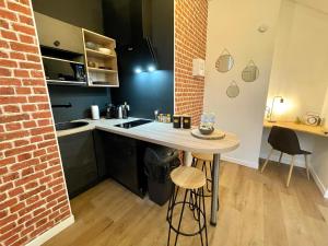 Appartements LE VOLTA - Appartement - Centre ville Calais : photos des chambres