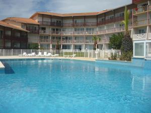 Appartements a cote Lac Marin de Port d'Albret : photos des chambres