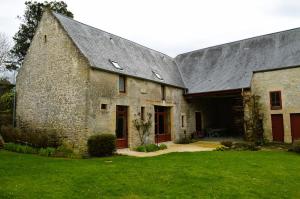 Maisons de vacances La Quinta, belle maison en pierres avec jardins : photos des chambres