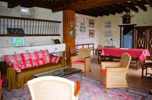 Maisons de vacances La Quinta, belle maison en pierres avec jardins : photos des chambres