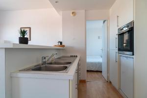Appartements Britania - Appt pour 7 proche plage : photos des chambres