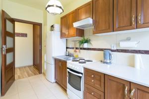 Przytulny apartament z parkingiem blisko Tauron Areny