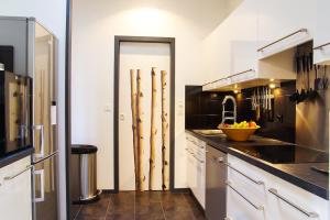 Appartements 444 Tourny - Localisation exceptionnelle 2 chambres avec ascenseur et Parking : photos des chambres