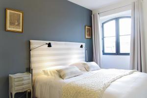 Appartements 444 Tourny - Localisation exceptionnelle 2 chambres avec ascenseur et Parking : photos des chambres