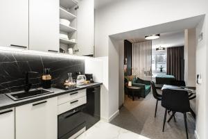 K20 Apartamenty Łódź - Dostęp na Kod