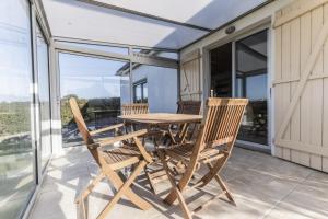 Jolie maison et sa véranda pour de belles vacances