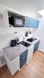 Le petit Château Avesnois - Studio en rez de jardin avec terrasse privée