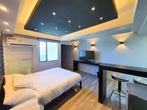 Burgundy McKinley Place Service Apartment