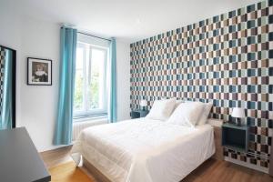 Appartements - L'Appart Oudinot I - : photos des chambres