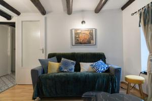 Appartements Le Chateau Taison au coeur du centre ville : photos des chambres