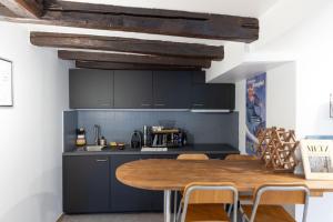 Appartements Le Chateau Taison au coeur du centre ville : photos des chambres