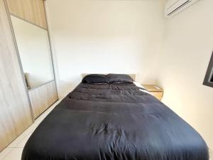Appartements Cosy T3 Tahaa - Parking - Clim : photos des chambres