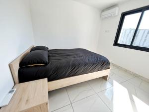 Appartements Cosy T3 Tahaa - Parking - Clim : photos des chambres