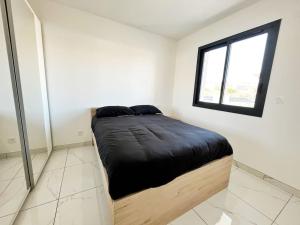 Appartements Cosy T2 Makatea - Parking - Clim : photos des chambres