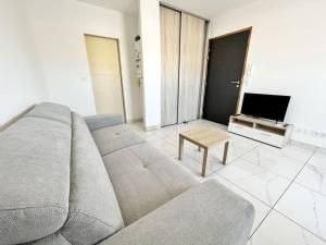 Appartements Studio Moorea - Parking - Clim : photos des chambres