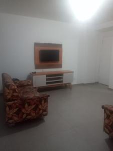 Apartamento com piscina 15 mim da Praia