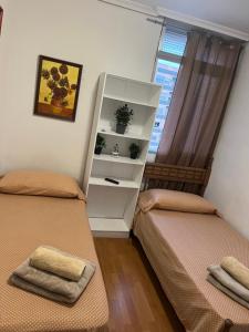 Malvarrosa habitación cómoda y sencilla cerca de la playa