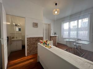 Appartements Le cottage des lumieres : photos des chambres